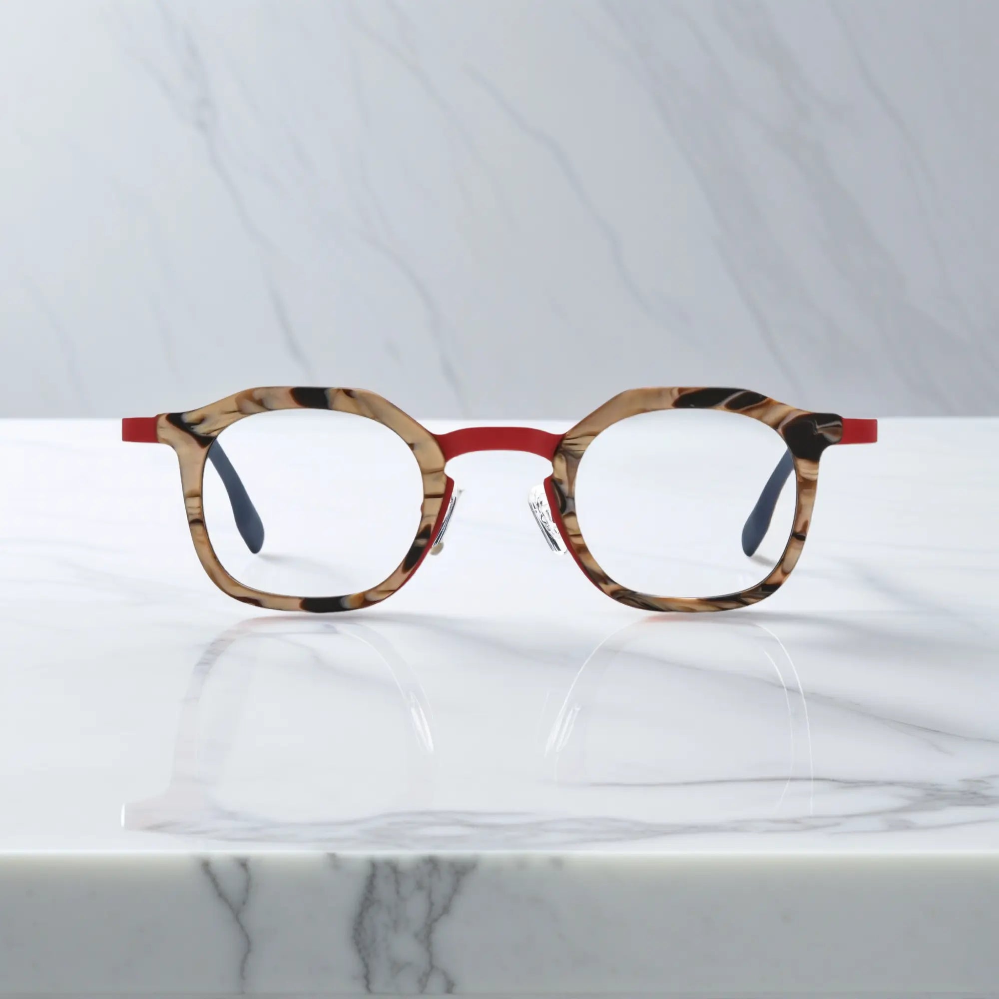 Front view of VoyueLens™ Crimson Drift square eyeglasses with a warm red acetate front with amber pattern and clean titanium temples.